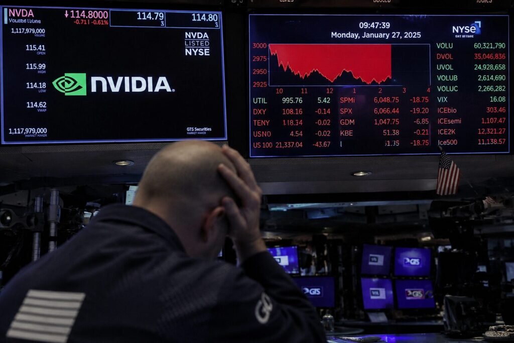 Nvidia Stock price A hyperrealistic stock market trading floor with large digital screens displaying Nvidia branding and declining market charts while a concerned trader watches, symbolizing Nvidia lagging the broader semiconductor rally.